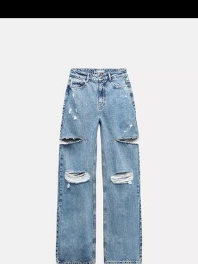 Zara Mid Waist Ripped Cut Out Jeans. Never worn, like new